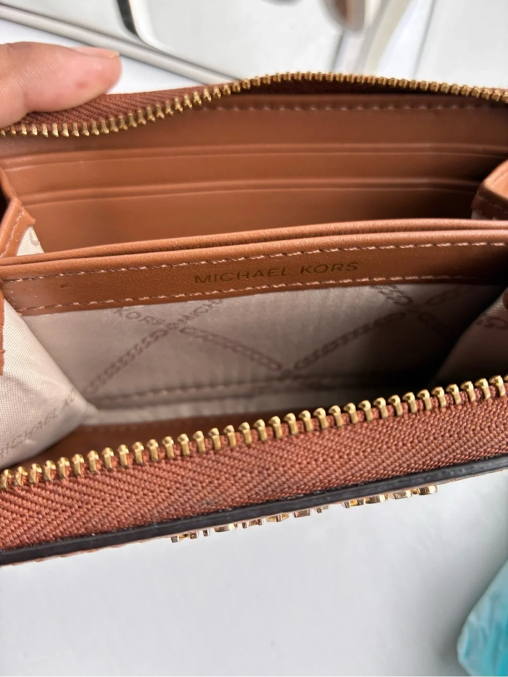 Michael Kors Tan Pebbled Leather Zip-Around Wallet with Gold Logo